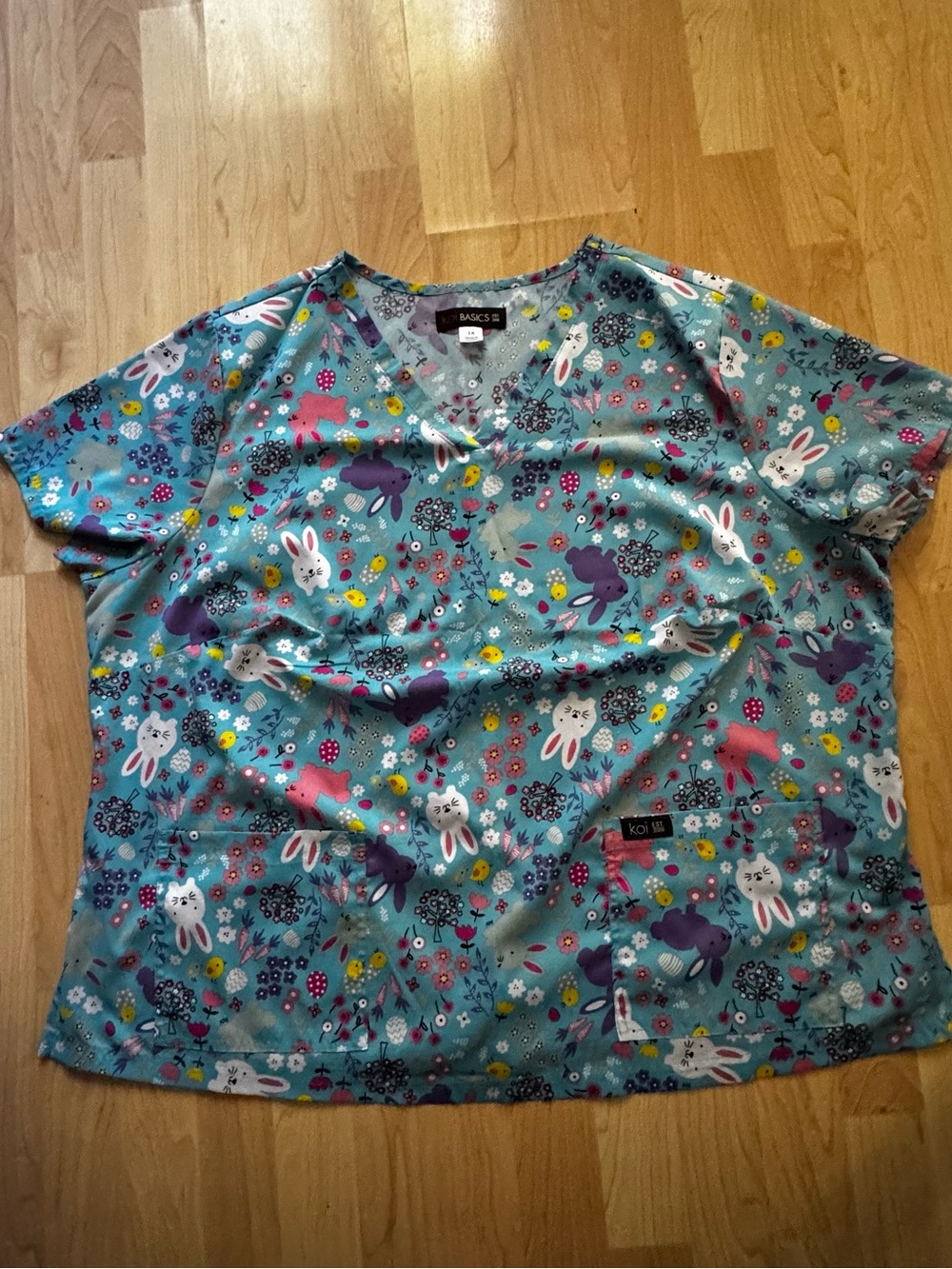 koi Easter Teal Bunny & Floral Short Sleeve Scrub Top